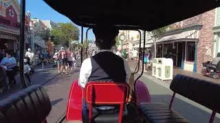 Riding in the Red Car down Main Street USA in Disneyland