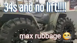 Putting 34 inch tires on a stock Polaris Sportman 800 (they fit)