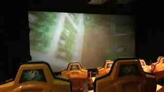 Still riding a toy ride inside the XD Theater at Fantasy Fair at Woodbine Centre Mall