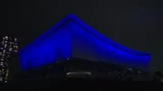 Tokyo Olympic venues lit up, with one year to go