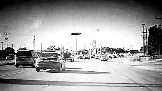Highway ghost girl crosses thru cars.