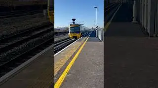GWR 166208 pulls into Westbury with the 1F08 Portsmouth Harbour to Cardiff on a sunny 28/2/28