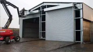 Portal Frame Industrial Steel Recycling Building by Sharp and Strong Ltd.