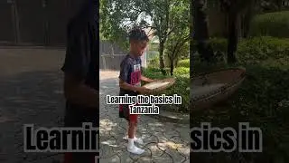 Cleaning rice the natural way  #africanlife #tanzania #africa #rice #basiclearningforkids