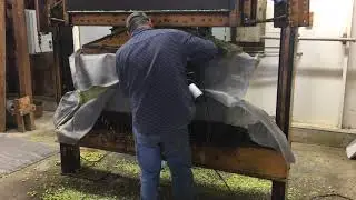 Bailing 200 pounds of hops at Goschie Farms