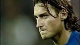 Trapattoni uses holy water before Totti freekick