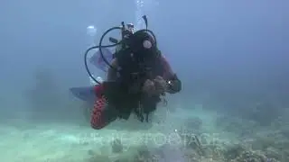Diver doing tricks with bubbles