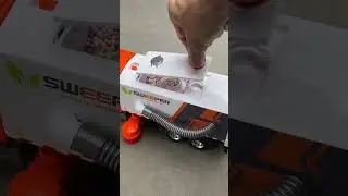Here comes this oversized electric vacuum truck! Love it!
