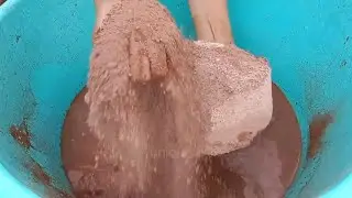 Gritty red dirt crumbling in water ASMR