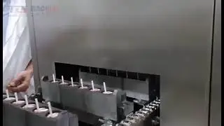 Automatic stick insertion device for lollipops