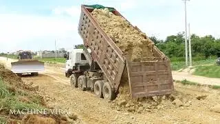 Abul Push the ground and dump truck unloading dirt skills driver building new road