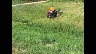 Altoz track machine mower with rough cut deck