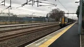 2T11 Glasgow Central-Largs 380105 passing  Hillington West 26/1/26 