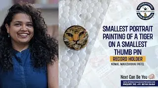 SMALLEST PORTRAIT PAINTING OF A TIGER  ON A SMALLEST THUMB PIN