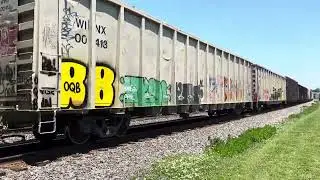 CSX trash train with a friendly crew and NS intermodal and both finish the same time in Berea Ohio 