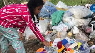 The girl rode a bicycle looking for an abandoned phone the trash and found many and toys be restored