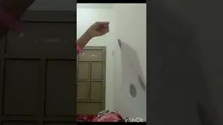 hand made kite at home using paper scissors  and glue