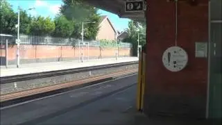 White Thameslink 319-432 and FCC 319-452 passing Horley Station, 3rd July 2016