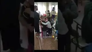 Ukrainian refugee child being welcomed by his new kindergarten class in Spain
