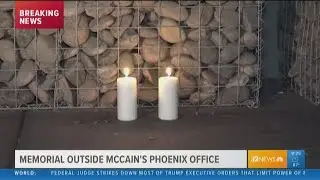 People pay respects to Senator McCain outside his Phoenix office