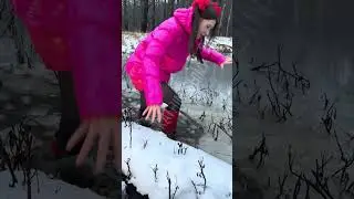 Beautiful lady gettin soaking wet stuck fully clothed in waterproof Hunter rainboots and shiny nylon