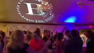 DJ Jimmy T DJing at a Wedding with Custom Monogram for Bride & Groom