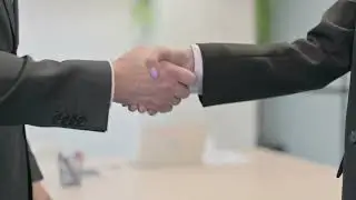 Business people shaking hand in office | Non-Copyrighted Stock Footage