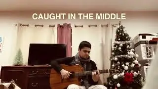 CAUGHT IN THE MIDDLE - Song Exploration