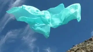 Blue silk on a stormy day flying in the wind