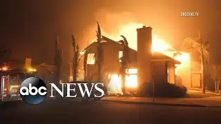 More than 27K evacuated as fire destroys town