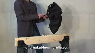 UZI&reg; Tactical Collapsible Umbrella vs Two-by-Four (2