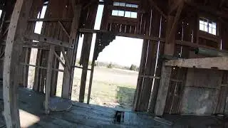 FPV Drone Flying Through an Abandoned Barn - Slow Mo DJI