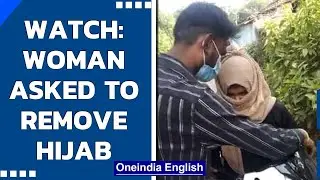 MP: A woman riding pillion is forced to take off hijab in Bhopal | Viral video | Oneindia News