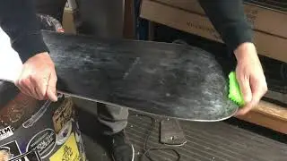 A quick and easy do-it-yourself way to wax a snowboard using the DaKine Quick Tune kit and iron