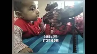 Viyona is practicing shooting with her gun #cutebaby #babbyshoot #like #gunplaying #toysandhobbies 