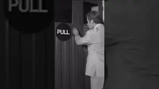 Benny Hill does what the signs say.
