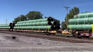 Norfolk Southern 121 with Twenty Dimensional Loads of Pipe on the Head End at Clymers, IN 
