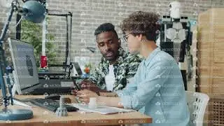 Man and woman making details for robot using 3D printer in modern office