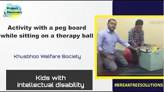 Activity with a peg board while sitting on a therapy ball|Breakfreesolutions