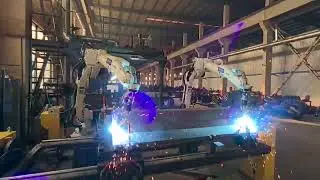 Dual - machine Collaborative Welding of OTC Robots FD B6L WBP400L