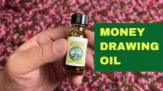 Money Drawing oil - hoodoo anointing oil for prosperity and cash