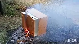 Burning old furniture outside the Barn 