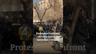 Protesters confront security forces in northeast Iran city
