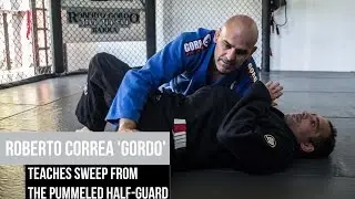 Roberto Correa teaches sweep from the pummeled half guard