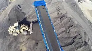 VIDEO of radial stacker conveyors processing dirt, sand, compost, mulch & crushed rock!
