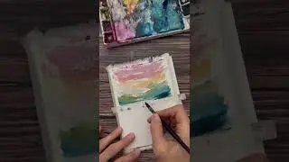 Quick watercolor landscape using all the colors of the rainbow