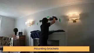 A Frame tv installation on a plaster wall with wire hidden