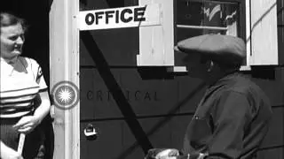 Civilians enter doorway to attend Ground Observer Corps meeting for Operation Sky...HD Stock Footage