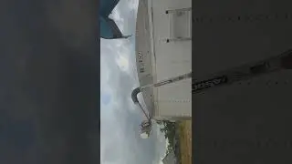 10 year old unloading grain cart into semi trailer.
