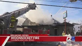 Crews respond to fire at Woonsocket business